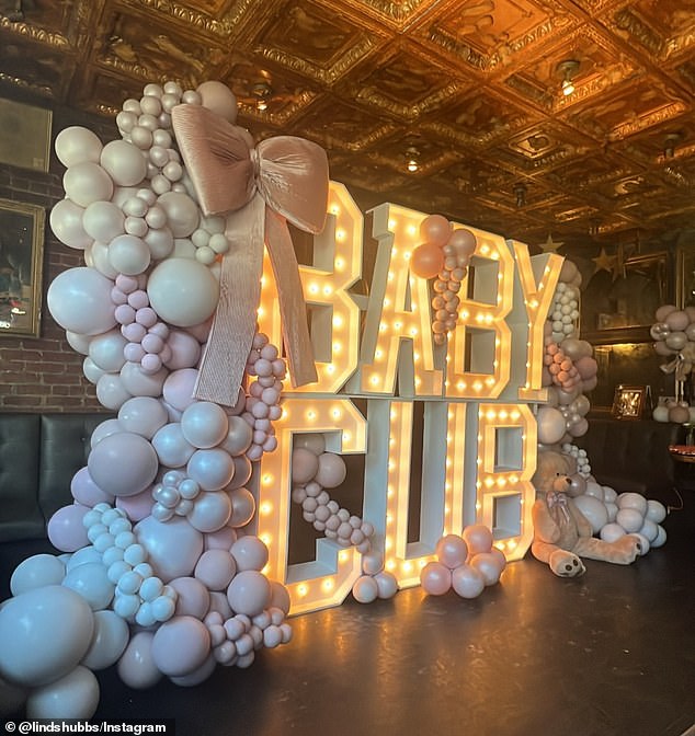 Dusty pink and mauve hues filled the baby shower venue, as did flowers from Dearest Rachel and a display from Balloon Thrill.