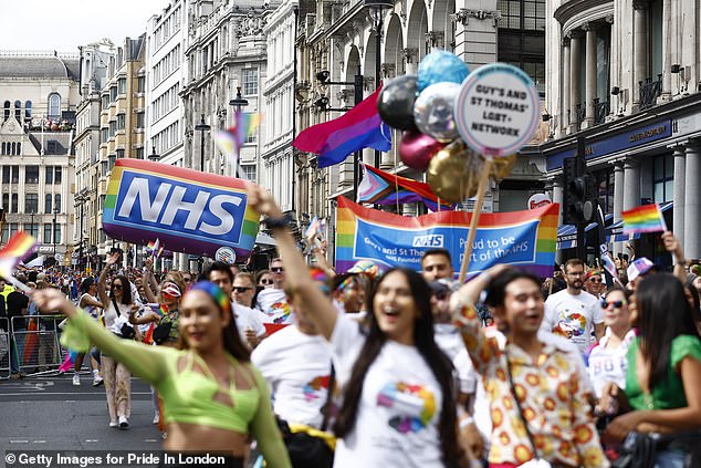 Mandatory training introduced in August for NHS England employees also stated that ¿it is people, not women or mothers, who become pregnant and take maternity leave. Pictured: Trafalgar Square during the Gay Pride Parade on July 1