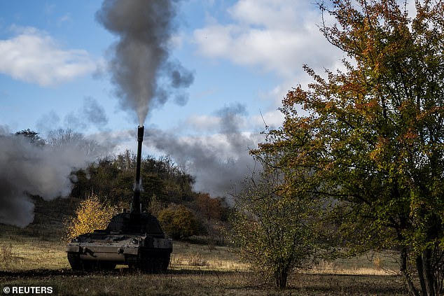 Ukrainian service members of the 43rd Separate Artillery Brigade Hetman Taras Triasylo fire on Russian troops in a Panzerhaubitze 2000 self-propelled howitzer, amid Russia's attack on Ukraine, at a position in the Donetsk region, Ukraine, 26 October 202