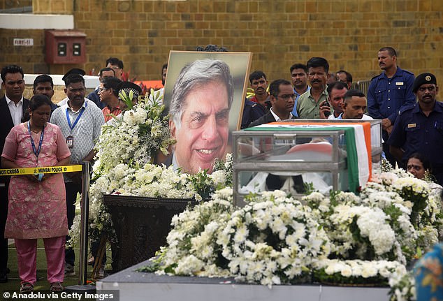 Mourners attend the funeral ceremony of Indian business tycoon Ratan Tata