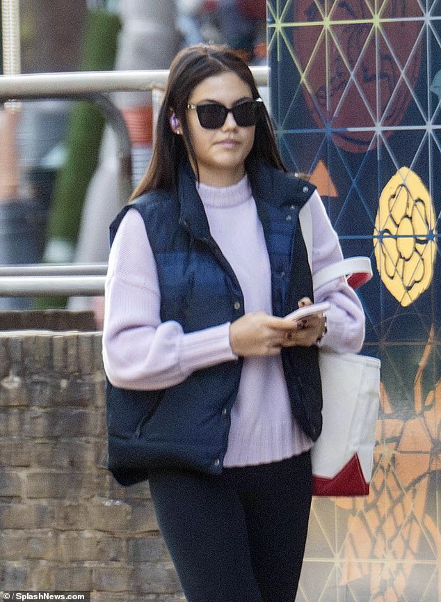 The athlete, who donned a pair of Airpods, seemed in her own world as the day went by on the solo outing.