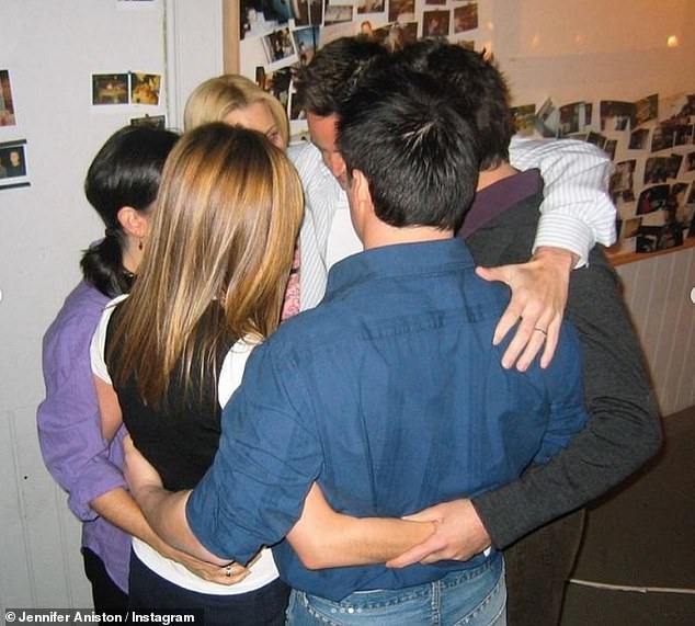 In this image that Jennifer shared on Monday, the cast is seen hugging on set.