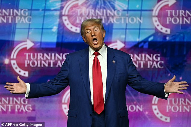 Donald Trump gestures as he arrives to speak during a Turning Point Action 'United for Change' campaign rally in Las Vegas, Nevada, on October 24.