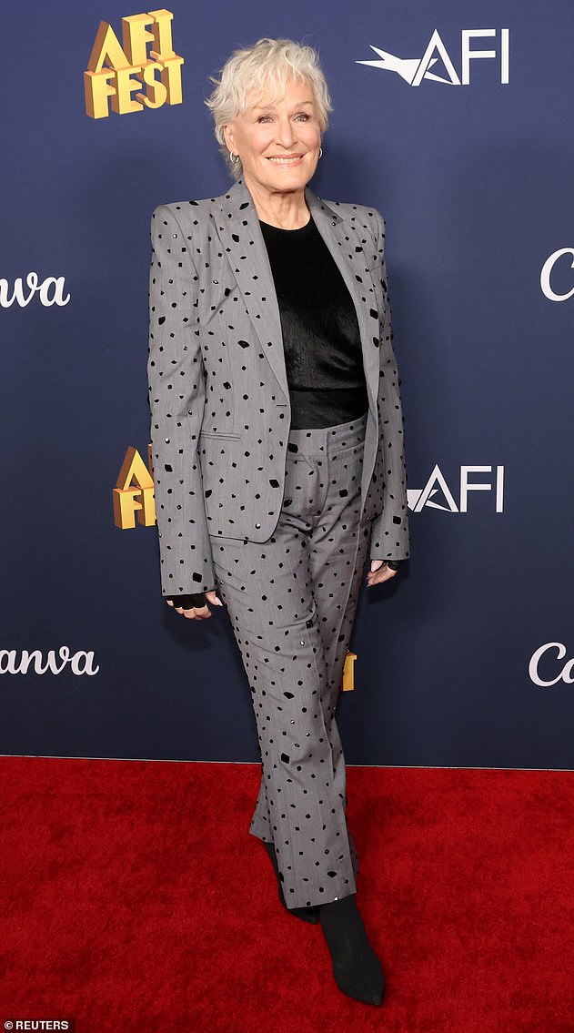 Close, 77, showed off her fit figure dressed in a gray printed suit and matching shoes.