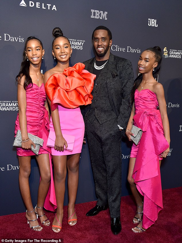 Diddy's daughters are reportedly in the care of a close friend of his late partner Kim Porter, while he remains in jail awaiting trial in a federal sex trafficking case; Diddy photographed with his daughters D'Lila, Chance and Jesse in 2020