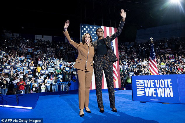 Vice President and Democratic presidential candidate Kamala Harris and former first lady Michelle Obama campaign together at the Wings Event Center in Kalamazoo, Michigan, on October 26, 2024.