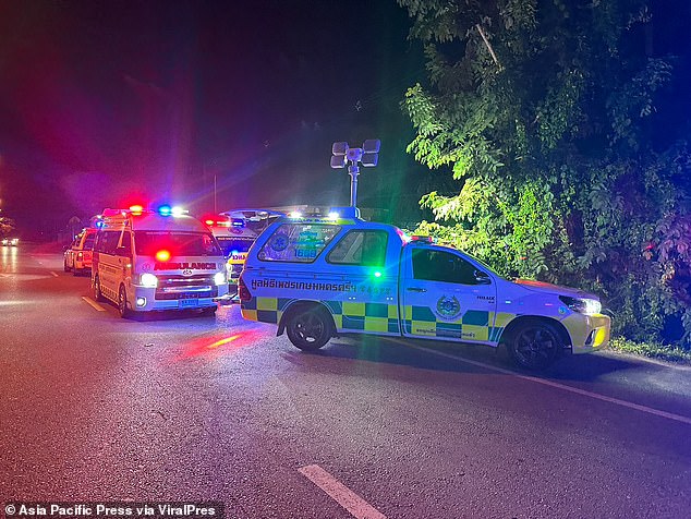 Police and ambulance services appear at the scene of the accident on October 21.