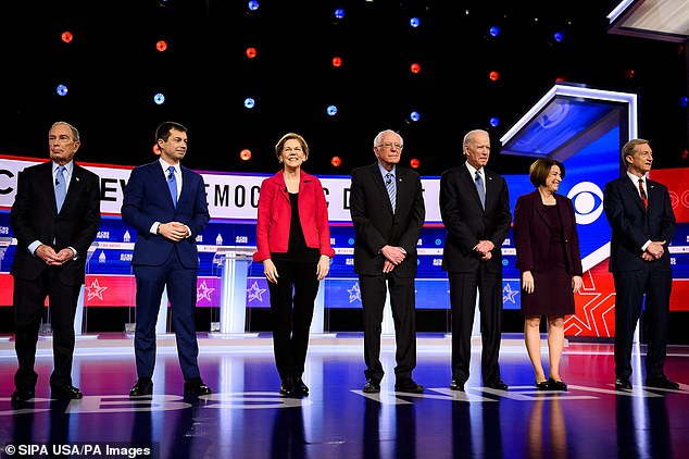 The New York Times reported that Michael Bloomberg (left) was scarred by his 2020 presidential bid, where he was humiliated on stage by Senator Elizabeth Warren (third from left).