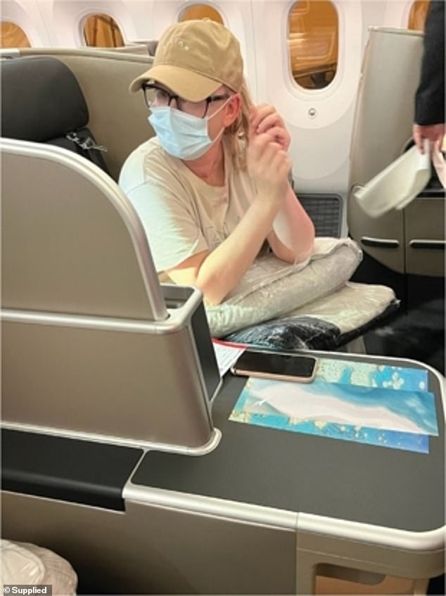 Another image shows Jackie flying business class while traveling 'incognito on her way to California and rehab.'