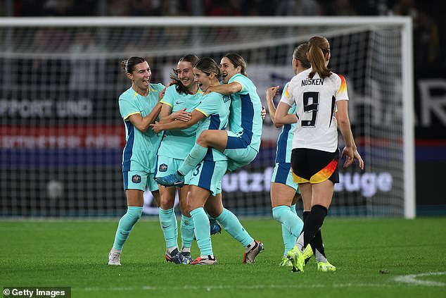 The midfielder was harassed by her teammates after scoring