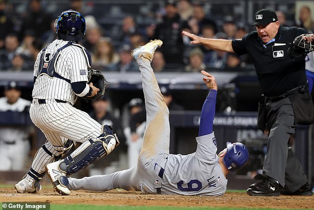 Gavin Lux slides in safely to add a fourth run for the Dodgers on a tough night for the Yankees