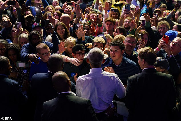 Former President Barack Obama, photographed in a crowd, also appeared at a pro-Harris rally in Philadelphia on Monday. There, he criticized Trump for holding an event 