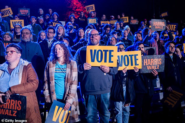 Supporters listen as Harris addresses them during the rally in Ann Arbor, Michigan.