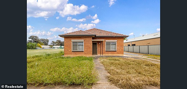 The only structures on the property are a small shed and this three-bedroom house built in 1955.