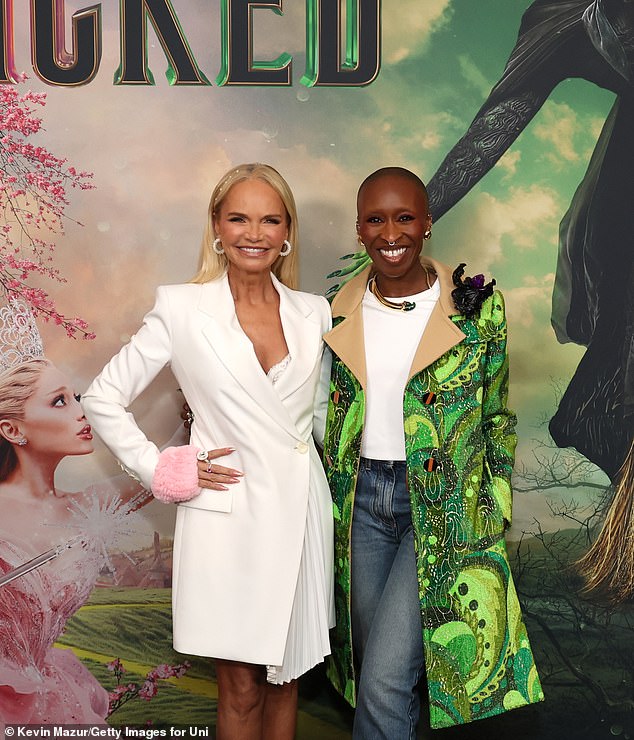 Chenoweth looked glamorous as always in a white dress that showed off her toned legs.