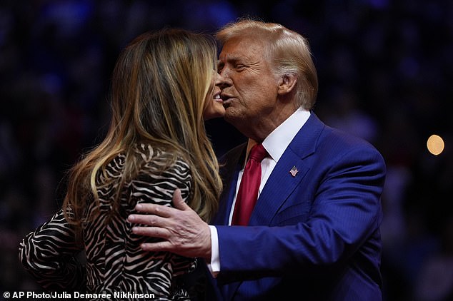 Trump was seen kissing former first lady Melania Trump during the campaign rally.