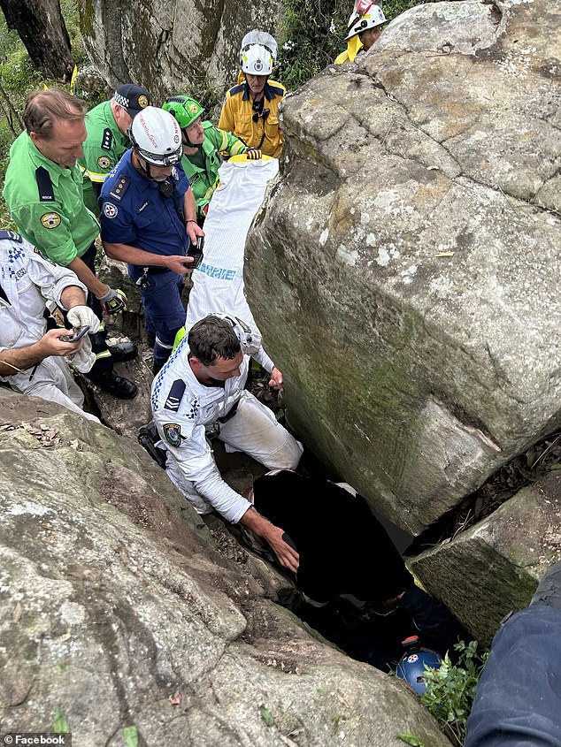 In a painstaking operation to access Ms Campbell, teams had to remove seven rocks weighing between 80 and 500 kilograms.