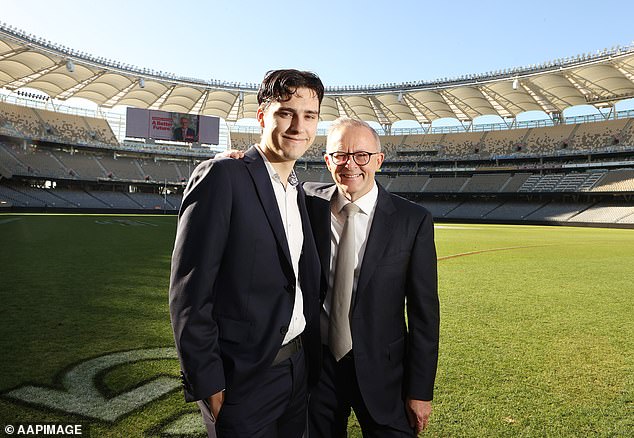 Albanese's son Nathan, 24, has also reportedly been granted access to the Qantas Chairman's Lounge (pictured, Albanese and his son Nathan in May 2022).