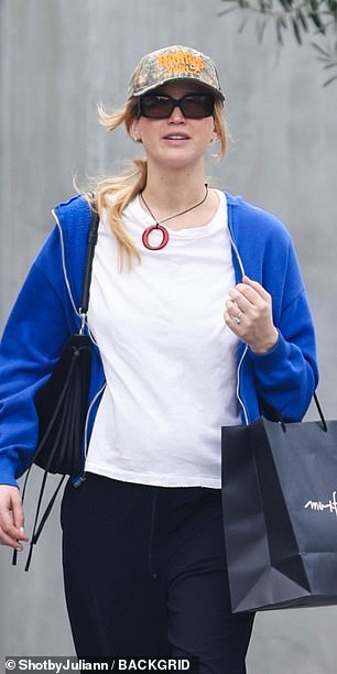 She added a royal blue zip-up hoodie.