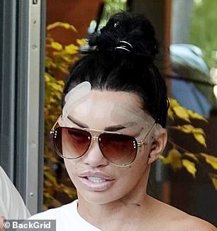 Katie Price is seen leaving the clinic after her facelift performed by Cagdas Orman in August 2024.