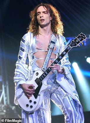 Justin photographed on stage in 2003