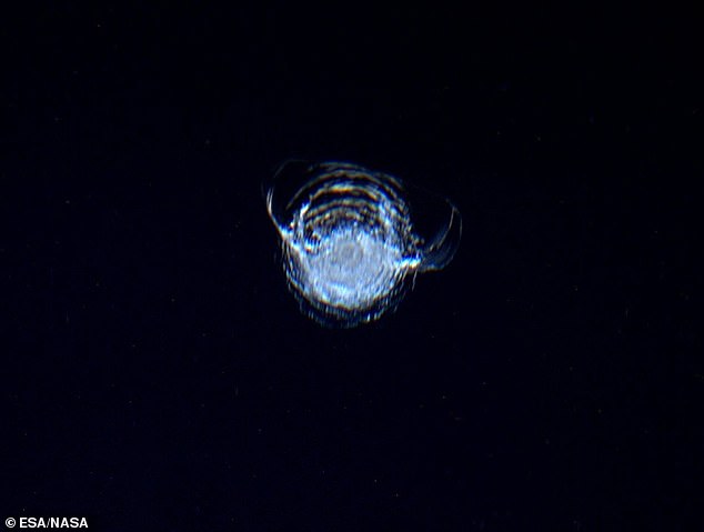 ESA astronaut Tim Peake took this photo from inside the dome in 2016, showing a 7mm diameter circular chip torn off by the impact of a small piece of space debris.