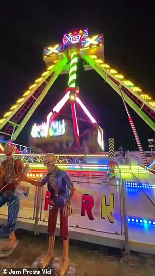 The video shows the attraction spinning and swinging.