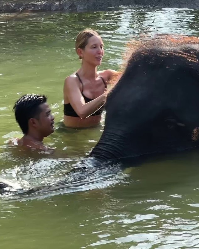 On a trip to Thailand, the London-based socialite and model shared a video of herself bathing an elephant in the river at the Pattaya Elephant Sanctuary in Bangkok.