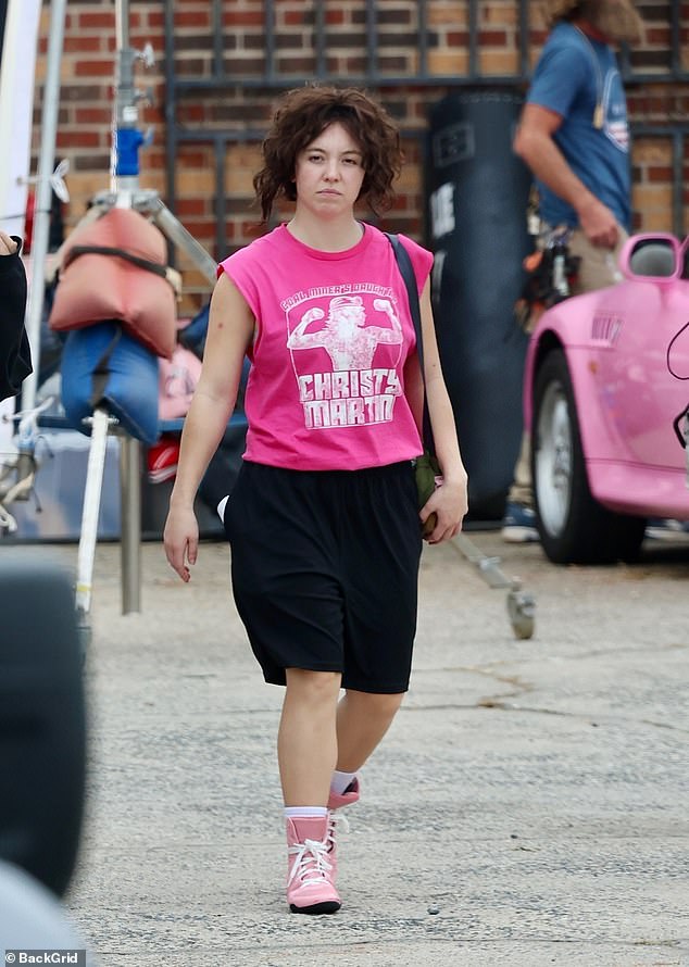 Trading in her usual red carpet look for a loose-fitting tracksuit, Sweeney donned a brunette wig, a pink tank top and dark shorts, capturing Martin's spirit from his early days in boxing.