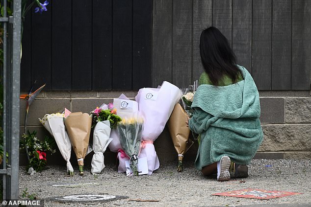 Teachers and students were seen leaving bouquets at the school Wednesday morning.