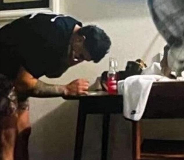 Mitchell was fined $20,000 by the NRL after the Integrity Unit investigated an image of him leaning over a table covered in white powder in a Dubbo hotel room (pictured).