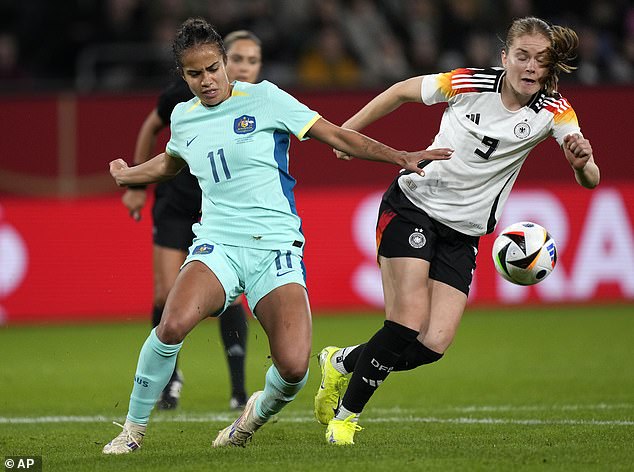 Fowler appears in action against Germany on Monday, with Cleary cheering her on from the stands alongside some of her teammates.