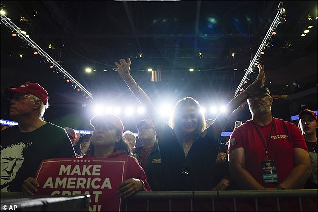 Supporters listen as former President Donald Trump, Republican presidential candidate, speaks at a campaign rally at the PPL Center, Tuesday, Oct. 29, 2024, in Allentown, Pennsylvania.