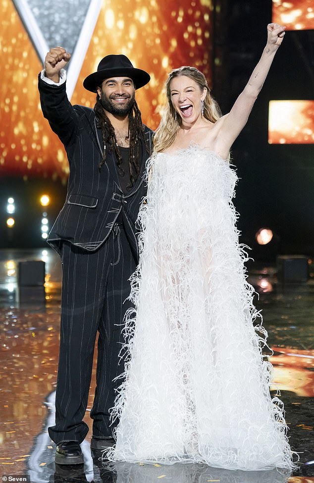 The 43-year-old singer began by congratulating the show's current winner, Reuben De Melo, before detailing how he came to his dramatic decision. In the photo: Rubén and Rimes.