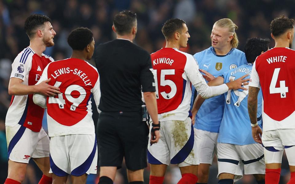 Arsenal's Myles Lewis-Skelly is detained after being involved in an altercation with Manchester City's Erling Haaland