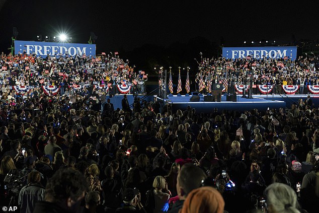 Security was tight at the outdoor event, with metal fencing surrounding the entire area south of the White House. Harris supporters waved American flags in the crowd.