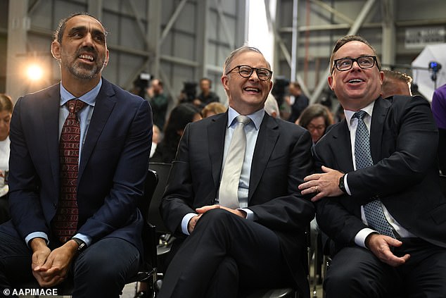 Former AFL star Adam Goodes, Albanese and Joyce at a Qantas event in 2023