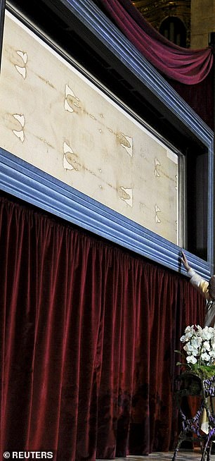 The Shroud first appeared in 1354 in France. After initially denouncing it as fake, the Catholic Church has now accepted the shroud as genuine. In the photo, Pope Francis visits the Shroud of Turin in 2015