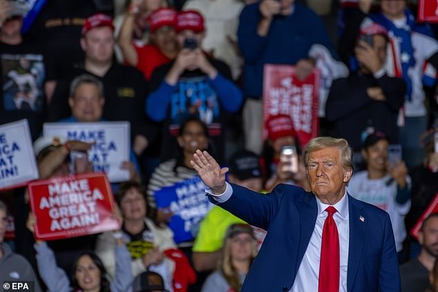 Former US president and Republican presidential candidate Donald J. Trump gestures during a campaign rally in Allentown, Pennsylvania, United States, on October 29, 2024.