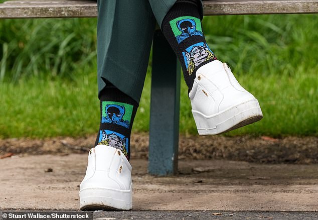 She was seen wearing Marvel superhero socks featuring the comic characters Thor and Black Panther.