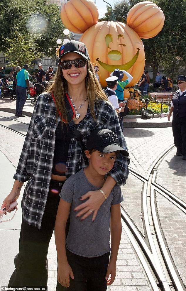 Her youngest son, Hayes, 6, was wearing red sneakers to match his older sisters, dark jeans and a gray T-shirt.