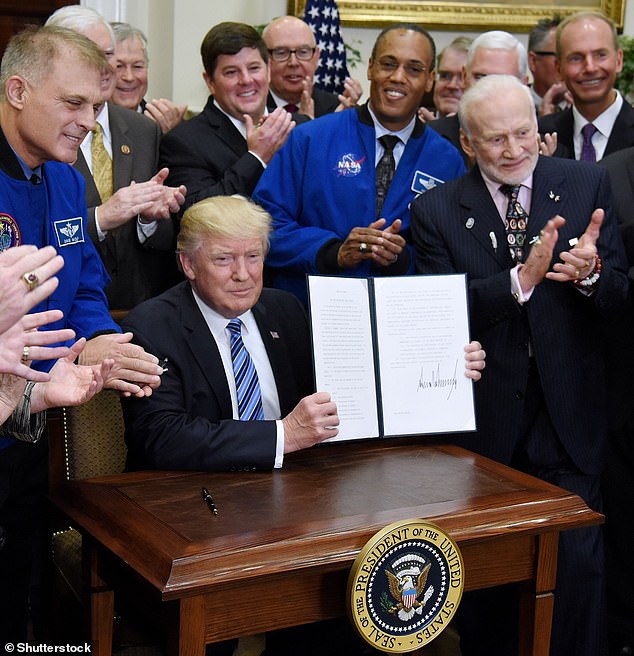 Aldrin was present in the Oval Office, next to the former president, when the National Space Council was reinstated after its dissolution in 1993.