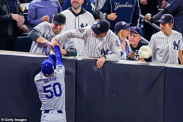 The friends were escorted out of the stadium but thought they would return for Game 5.