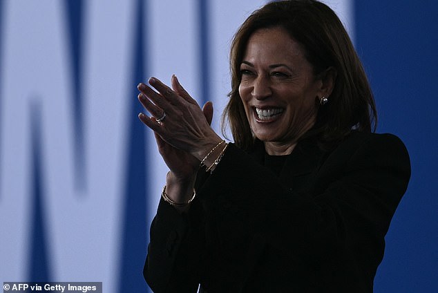 Kamala Harris waves to supporters before speaking during a Get Out the Vote rally in Raleigh, North Carolina, on October 30.