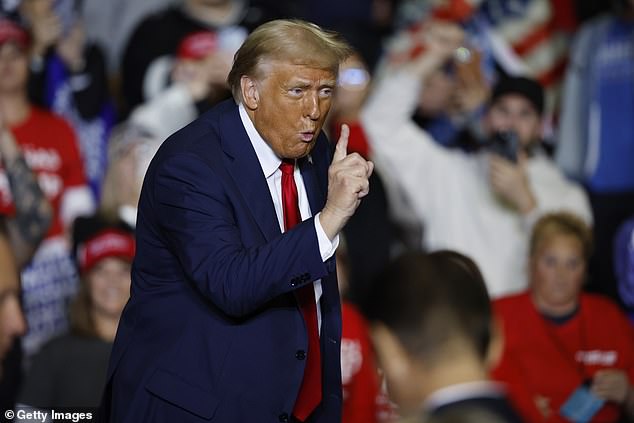 Republican presidential candidate former President Donald Trump gestures at a campaign rally at the PPL Center on October 29, 2024 in Allentown, Pennsylvania.