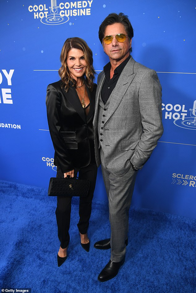 Loughlin was photographed with her Full House co-star John Stamos during Tuesday's event.