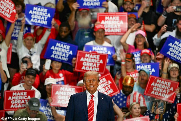 Former United States President and 2024 Republican presidential candidate Donald Trump arrives to speak at a campaign rally at the Rocky Mount Event Center in Rocky Mount, North Carolina, on October 30, 2024.