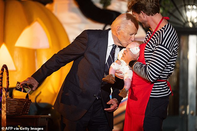 President Biden kisses a ghost baby