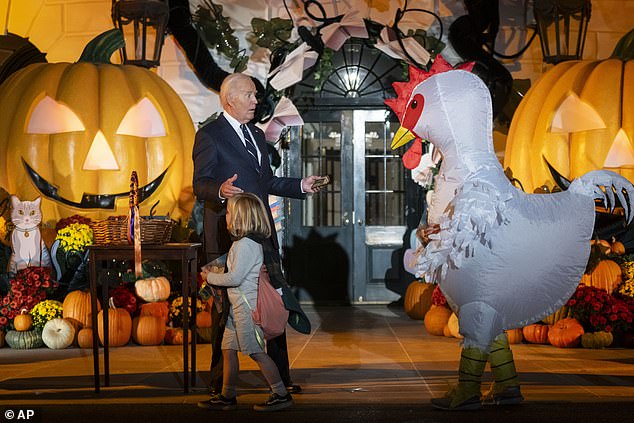 The president is surprised by a big chicken