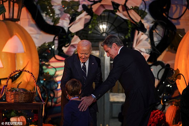 Secretary of State Antony Blinken and his son greet President Biden